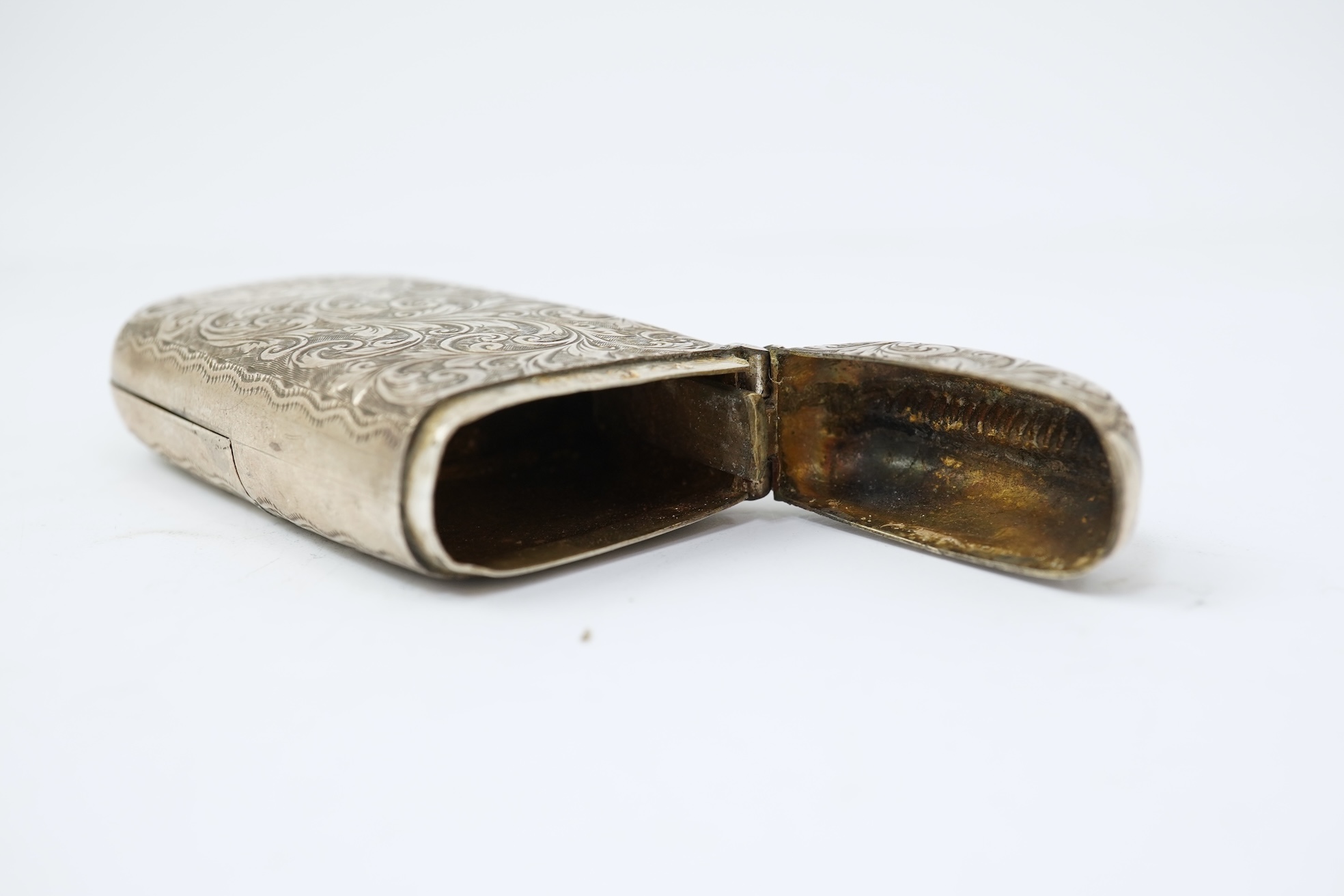 A late Victorian engraved silver oval combination sovereign and vesta case, by JW